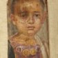 المتحف المصري ٢٠٠ عام علم مصريات 
صورة لصبي من بورتريهات الفيوم ، يرتدي خيتون أرجواني اللون  ( نوع من الملابس)